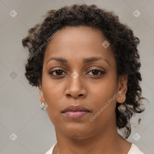 Neutral black young-adult female with short  brown hair and brown eyes