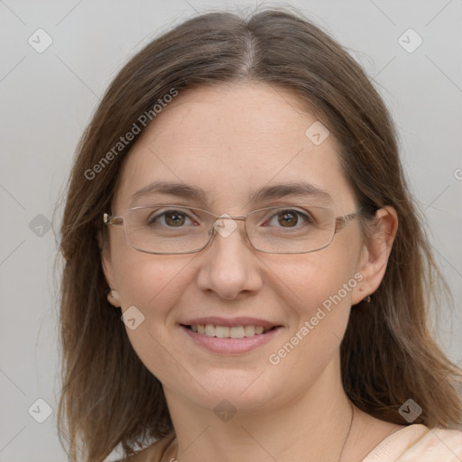 Joyful white adult female with medium  brown hair and grey eyes