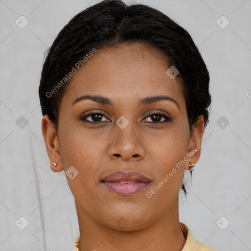 Joyful black young-adult female with short  brown hair and brown eyes