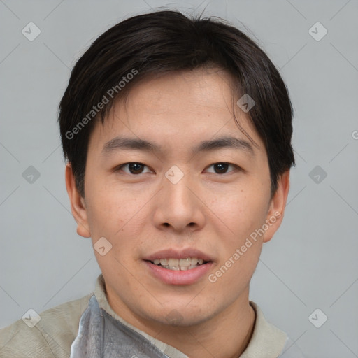 Joyful asian young-adult male with short  brown hair and brown eyes