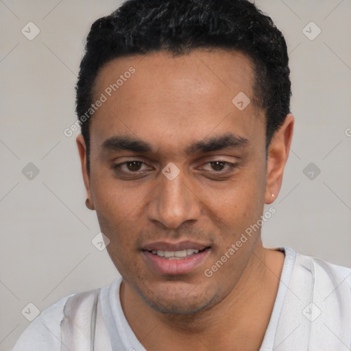 Joyful white young-adult male with short  black hair and brown eyes