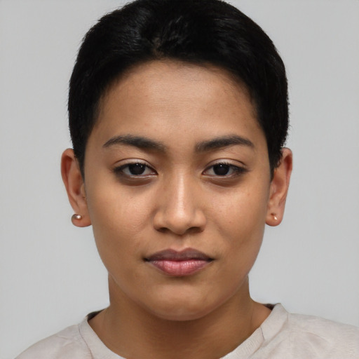 Joyful asian young-adult female with short  black hair and brown eyes