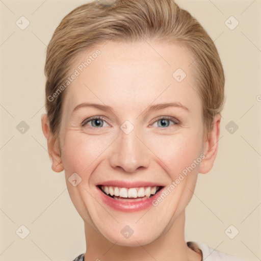 Joyful white young-adult female with short  brown hair and grey eyes