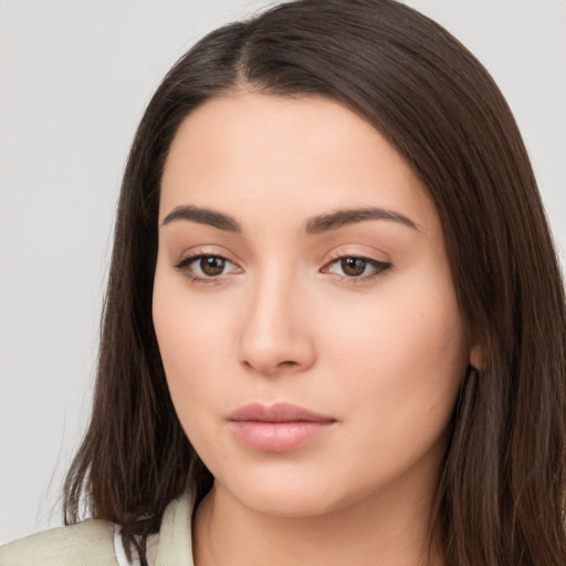 Neutral white young-adult female with long  brown hair and brown eyes