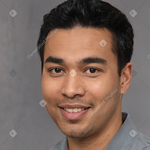 Joyful white young-adult male with short  black hair and brown eyes