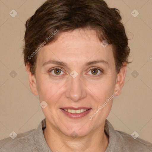 Joyful white adult female with short  brown hair and brown eyes