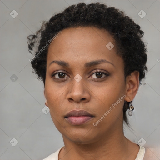 Neutral black young-adult female with short  black hair and brown eyes