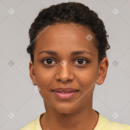 Joyful black young-adult female with short  brown hair and brown eyes