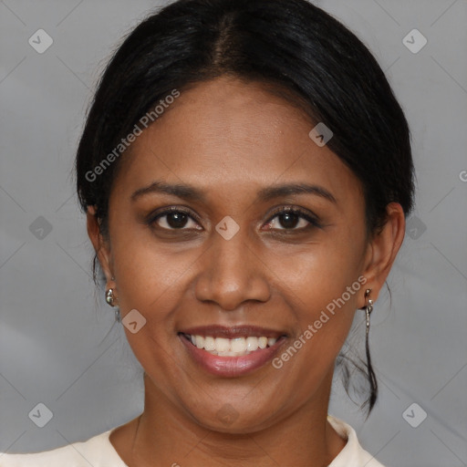 Joyful black young-adult female with medium  brown hair and brown eyes