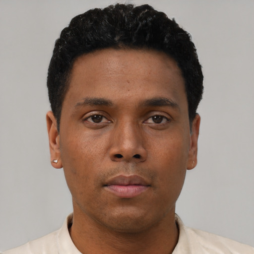 Neutral black young-adult male with short  black hair and brown eyes