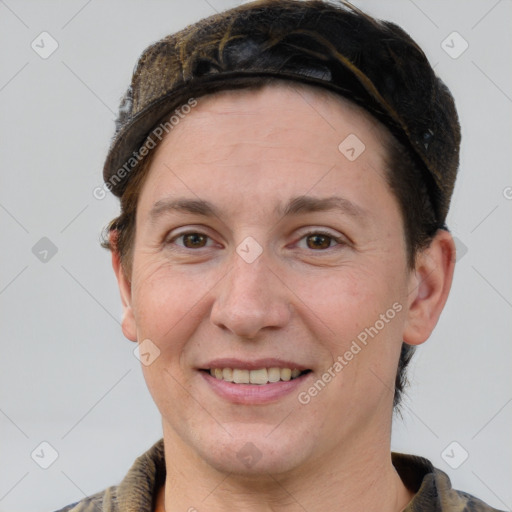 Joyful white adult female with short  brown hair and grey eyes