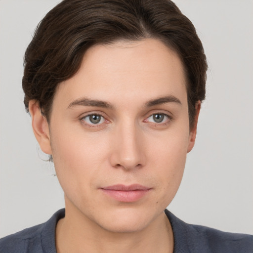 Neutral white young-adult female with short  brown hair and brown eyes