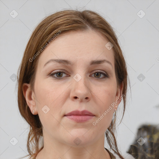 Joyful white adult female with medium  brown hair and grey eyes