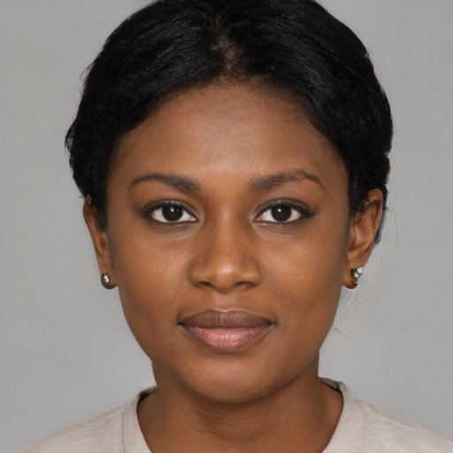 Joyful asian young-adult female with short  black hair and brown eyes