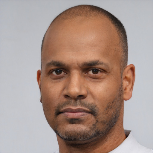 Neutral black adult male with short  black hair and brown eyes