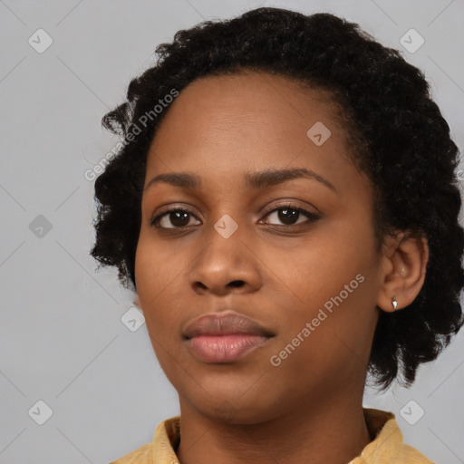 Neutral black young-adult female with short  black hair and brown eyes