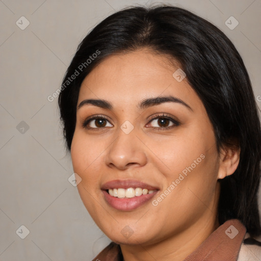 Joyful latino young-adult female with medium  black hair and brown eyes