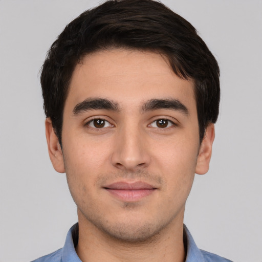 Neutral white young-adult male with short  black hair and brown eyes