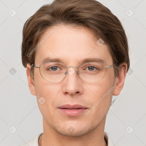 Joyful white adult male with short  brown hair and grey eyes