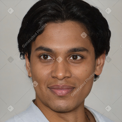 Joyful latino young-adult male with short  black hair and brown eyes