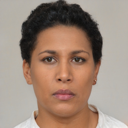Neutral latino young-adult female with short  brown hair and brown eyes