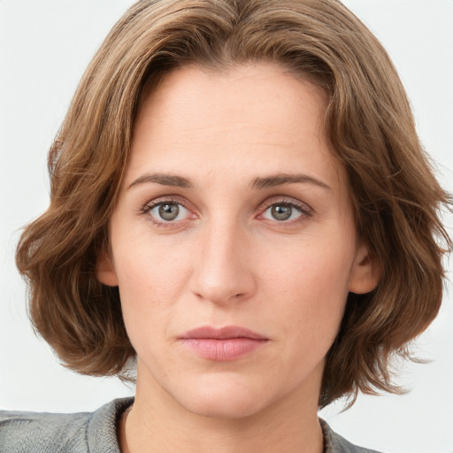 Neutral white young-adult female with medium  brown hair and blue eyes