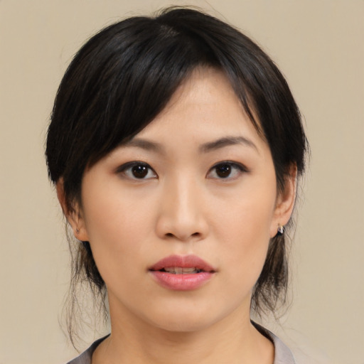 Neutral asian young-adult female with medium  black hair and brown eyes