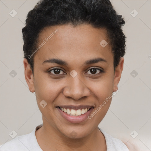 Joyful latino young-adult female with short  black hair and brown eyes