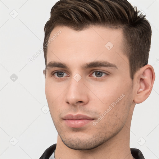 Neutral white young-adult male with short  brown hair and brown eyes