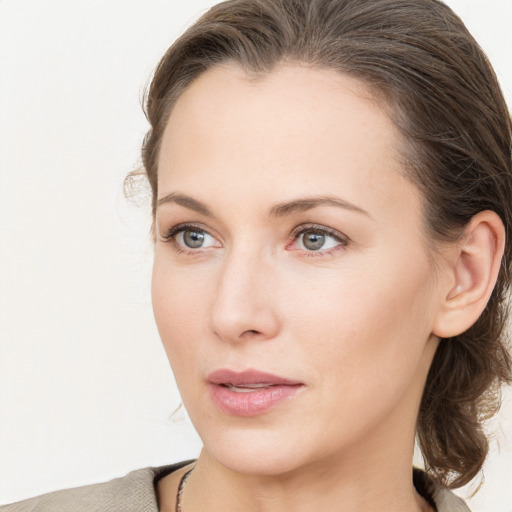 Neutral white young-adult female with medium  brown hair and grey eyes