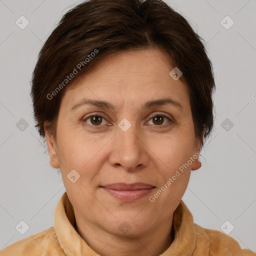 Joyful white adult female with short  brown hair and brown eyes