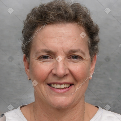 Joyful white adult female with short  brown hair and brown eyes