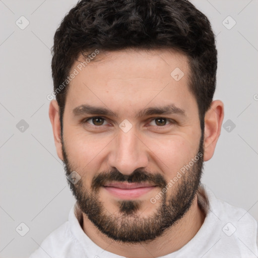 Joyful white young-adult male with short  black hair and brown eyes