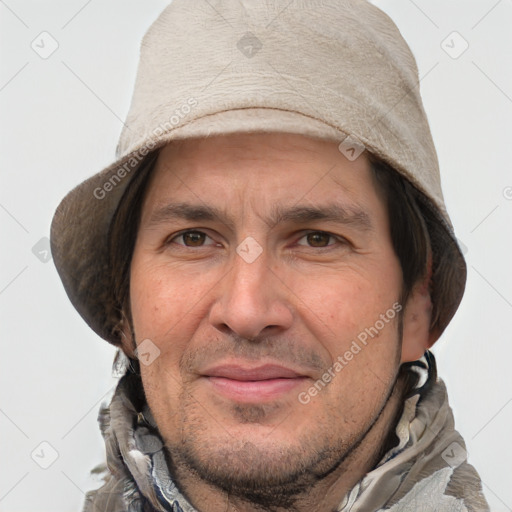 Joyful white adult male with short  brown hair and grey eyes