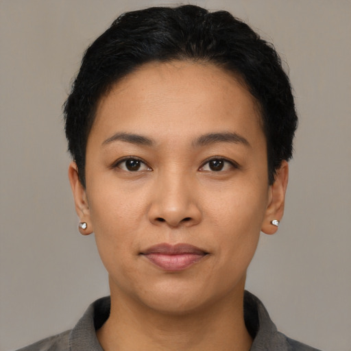 Neutral latino young-adult female with short  black hair and brown eyes