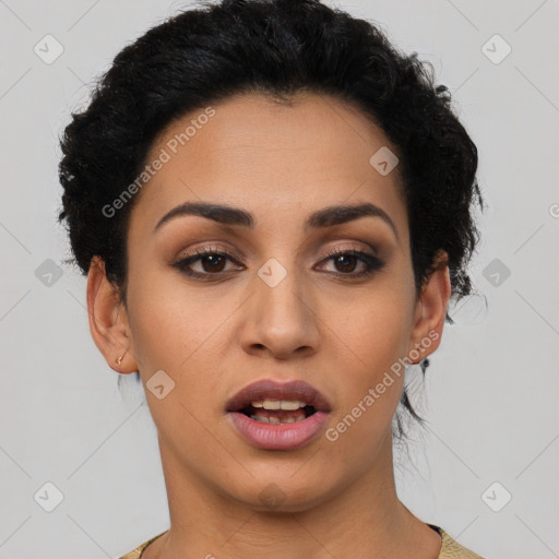 Joyful latino young-adult female with short  brown hair and brown eyes