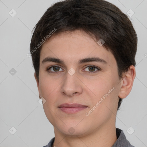 Joyful white young-adult female with short  brown hair and grey eyes