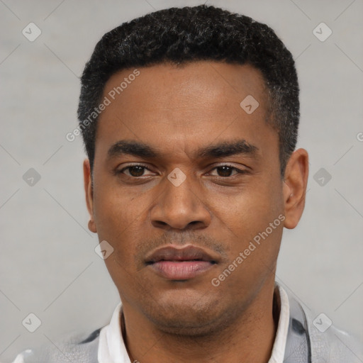 Neutral latino young-adult male with short  black hair and brown eyes