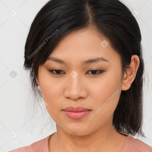 Joyful asian young-adult female with medium  brown hair and brown eyes