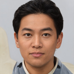 Neutral asian young-adult male with short  black hair and brown eyes