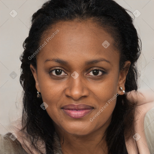 Joyful black young-adult female with long  brown hair and brown eyes