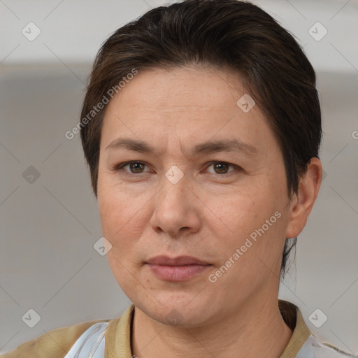 Joyful white adult female with short  brown hair and brown eyes