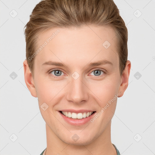 Joyful white young-adult female with short  brown hair and grey eyes