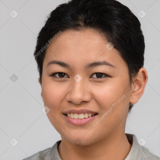 Joyful asian young-adult female with short  brown hair and brown eyes