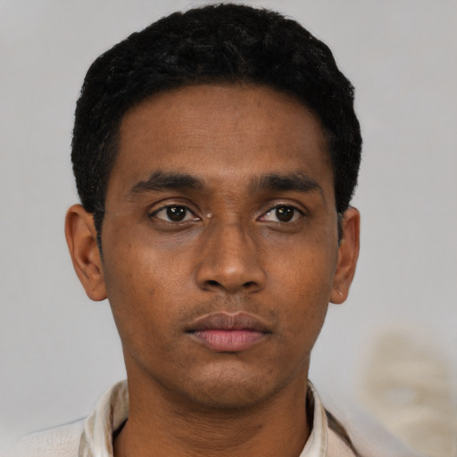Neutral black young-adult male with short  black hair and brown eyes