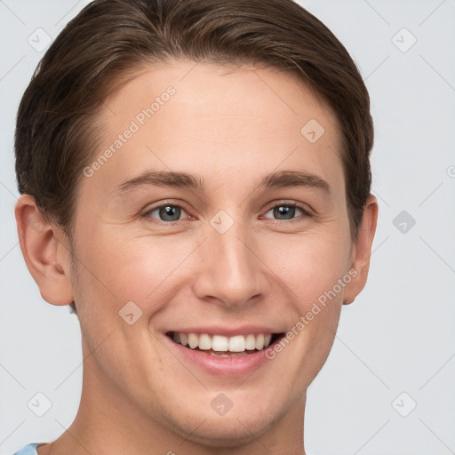 Joyful white young-adult female with short  brown hair and grey eyes