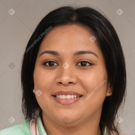 Joyful latino young-adult female with medium  brown hair and brown eyes