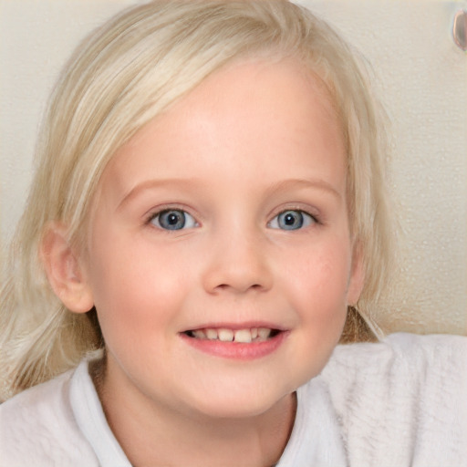 Joyful white child female with medium  blond hair and blue eyes