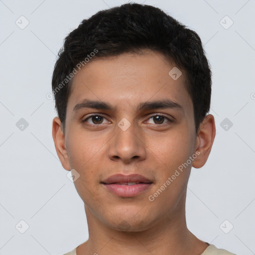 Joyful latino young-adult male with short  brown hair and brown eyes