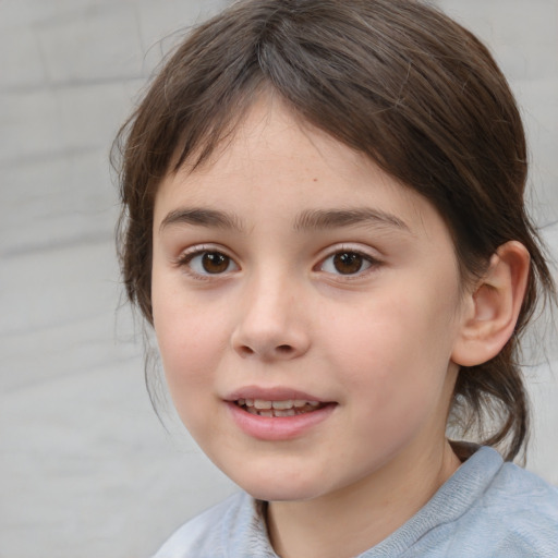 Joyful white child female with medium  brown hair and brown eyes